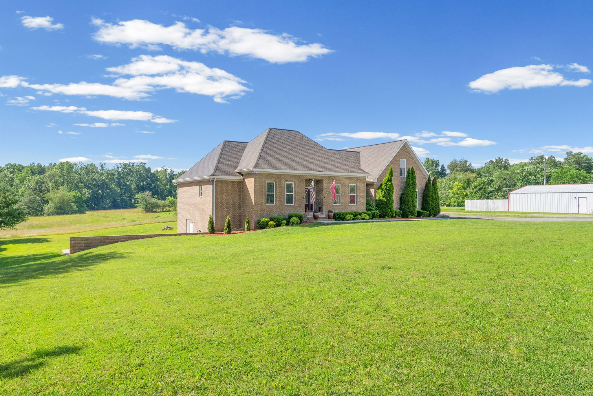 4940 Marion Road Cunningham, TN 37052 - Photo 41 of 43 a front view of house with yard and ocean view