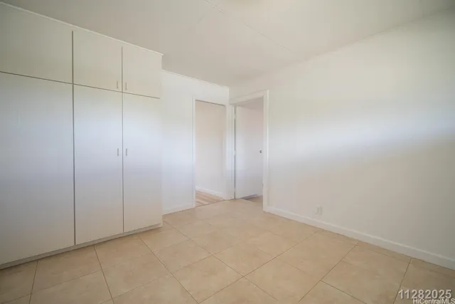 a kitchen with cabinets stainless steel appliances and a sink