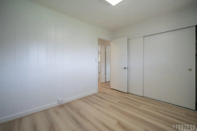 a bathroom with a granite countertop toilet a sink and a bathtub