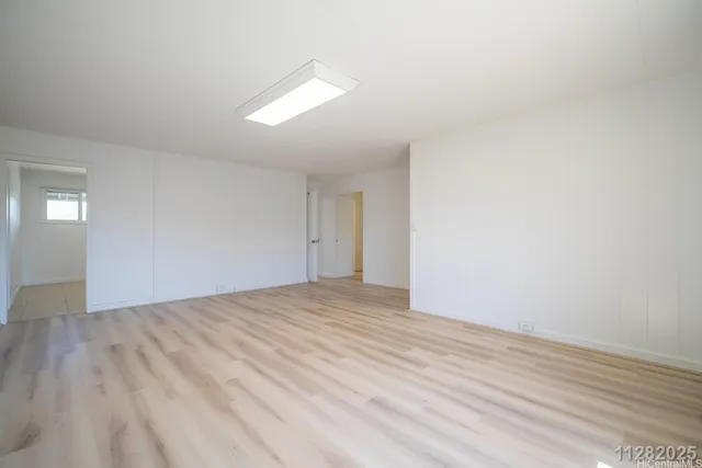 a view of an empty room and window