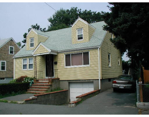 11 Oak Road Medford, MA 02155 - Photo 1 of 1 a front view of a house with a yard