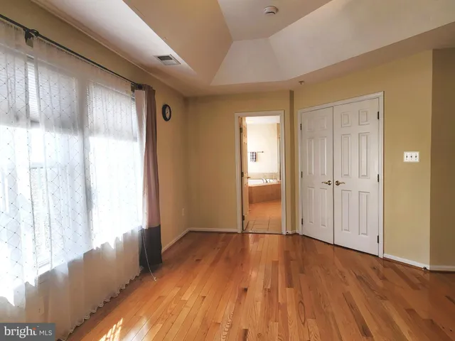 a view of hallway with natural light