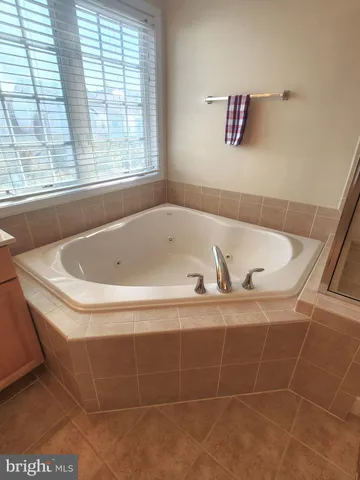 a bathroom with a bathtub