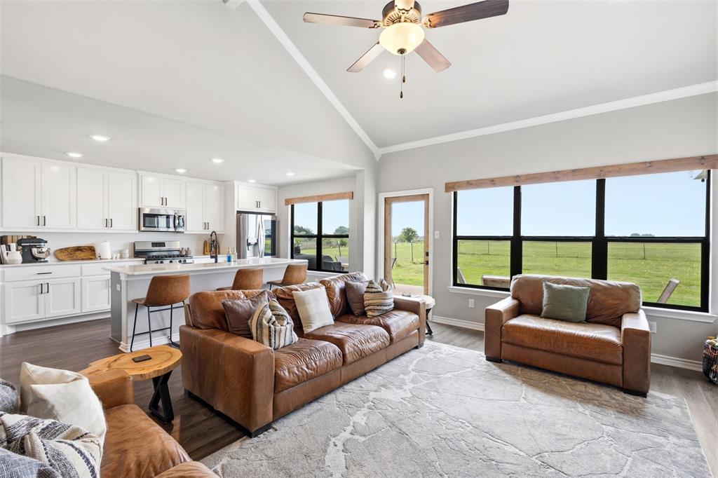2990 Wilson Road Palmer, TX 75152 - Photo 13 of 40 a living room with furniture and a large window with kitchen view