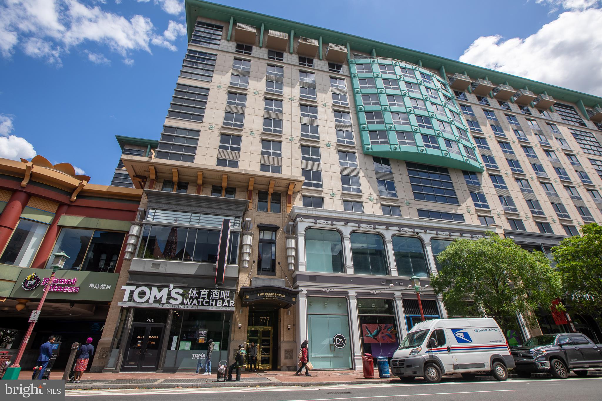 777 7th Street Northwest, Unit 1017 Washington, DC 20001 - Photo 13 of 13 a front view of a building with street