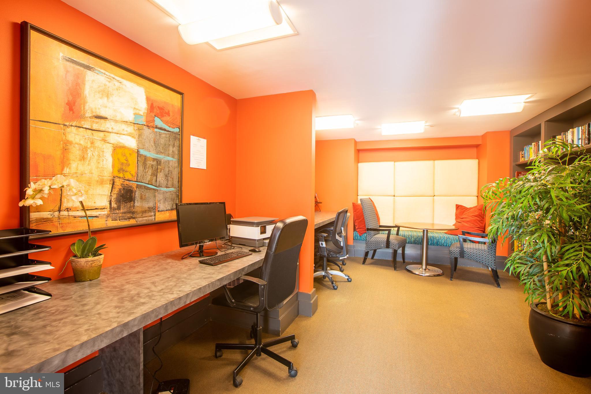 777 7th Street Northwest, Unit 1017 Washington, DC 20001 - Photo 10 of 13 a view of a workspace with furniture