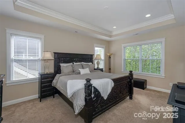 a bed room with a bed and a couch