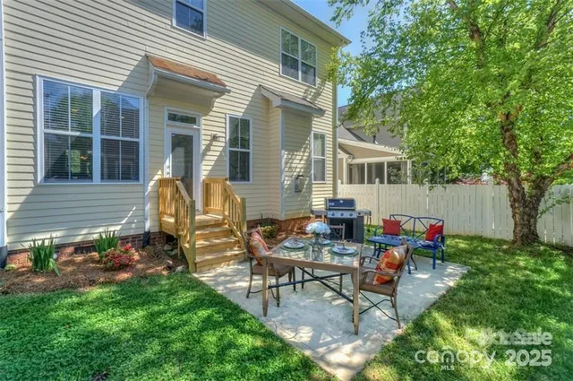 a front view of house with outdoor seating