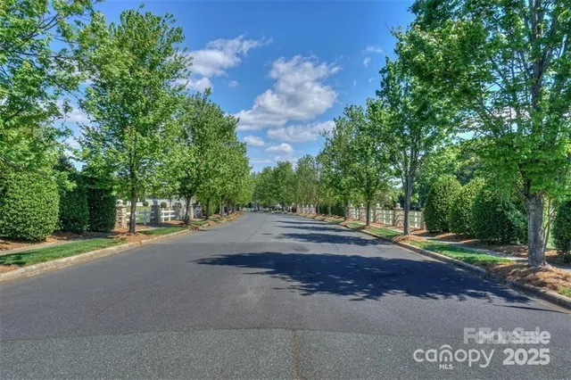 a view of a street with a houses
