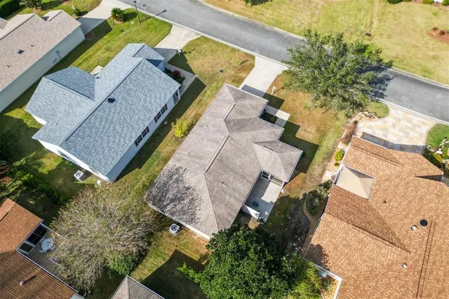 an aerial view of a house having swimming pool
