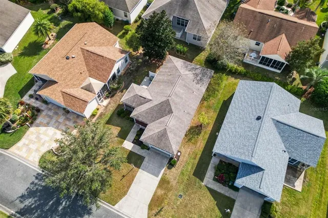 an aerial view of a house with a garden