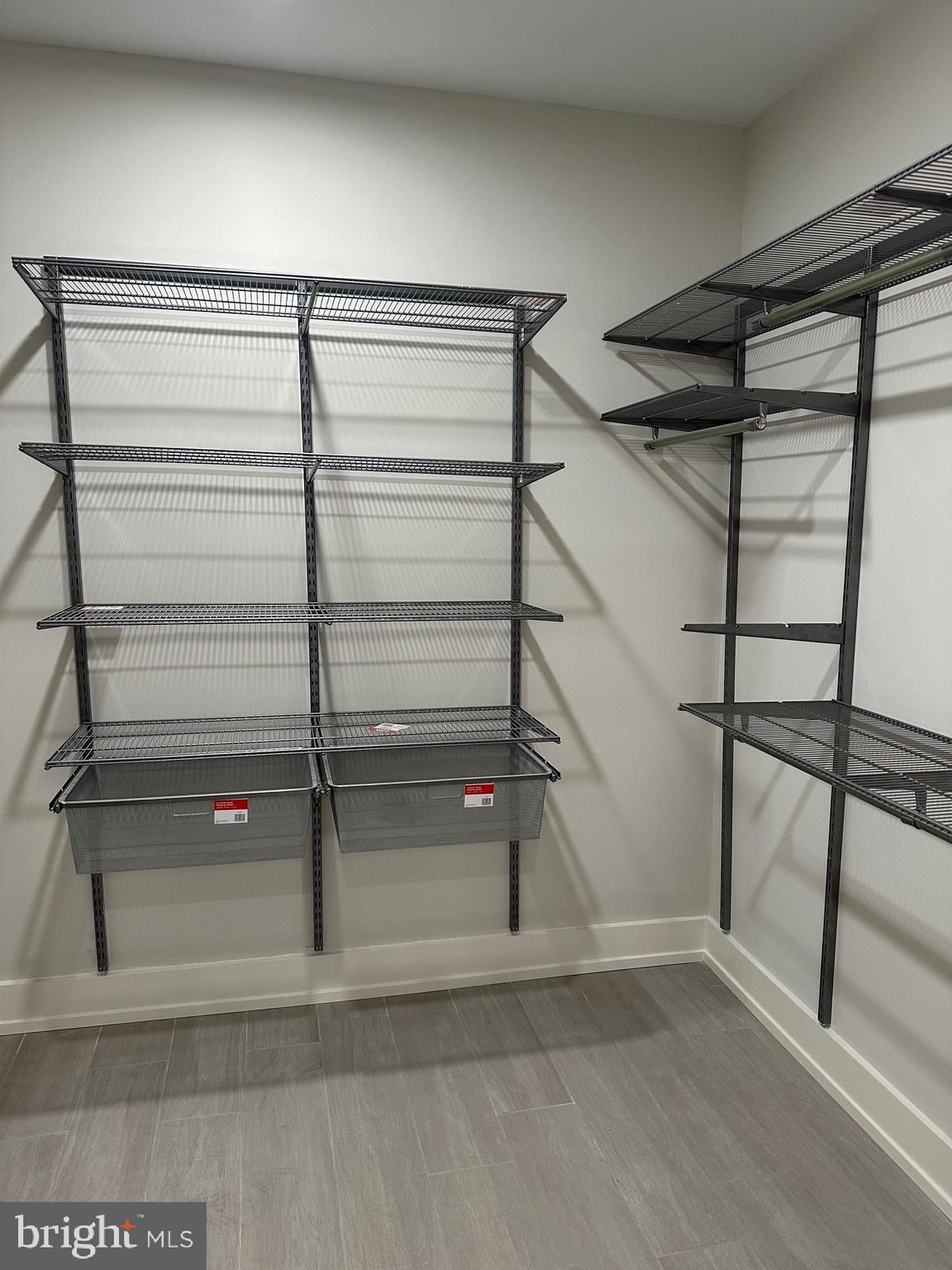1744 Lanier Place Northwest, Unit 1 Washington, DC 20009 - Photo 24 of 39 a view of walk in closet with empty racks