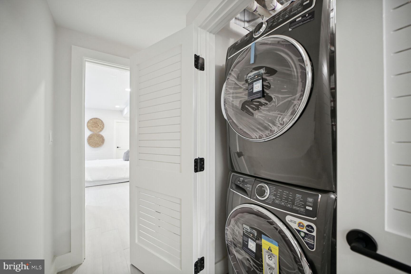 1744 Lanier Place Northwest, Unit 1 Washington, DC 20009 - Photo 26 of 39 a utility room with dryer and washer
