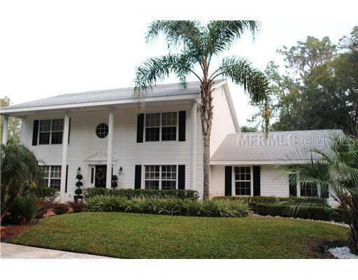 417 N Road Lakeland, FL 33809 - Photo 1 of 1 a front view of a residential houses with yard and green space
