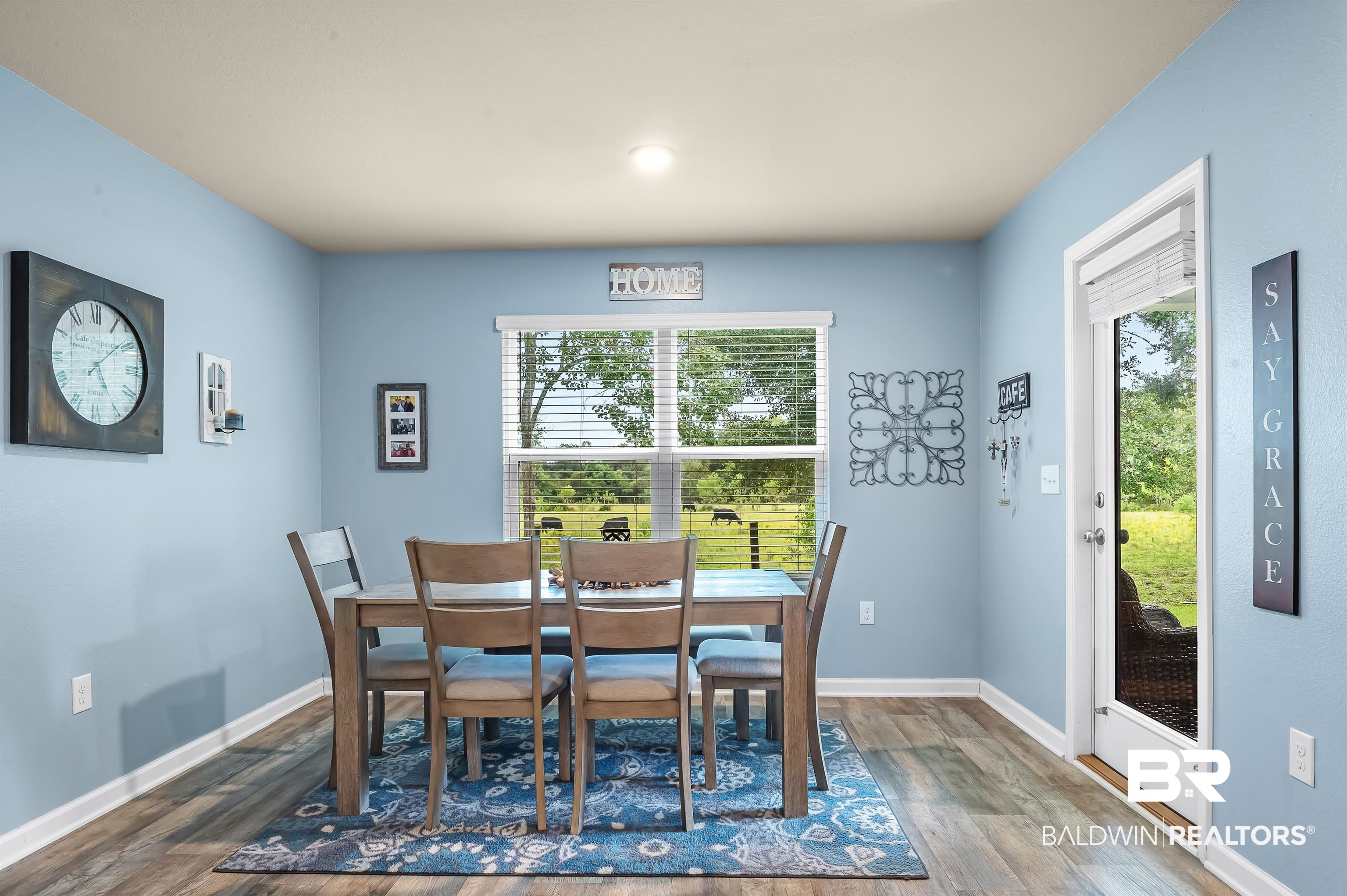 17985 Lewis Smith Drive Foley, AL 36535 - Photo 19 of 56 Dining space featuring hardwood / wood-style floors