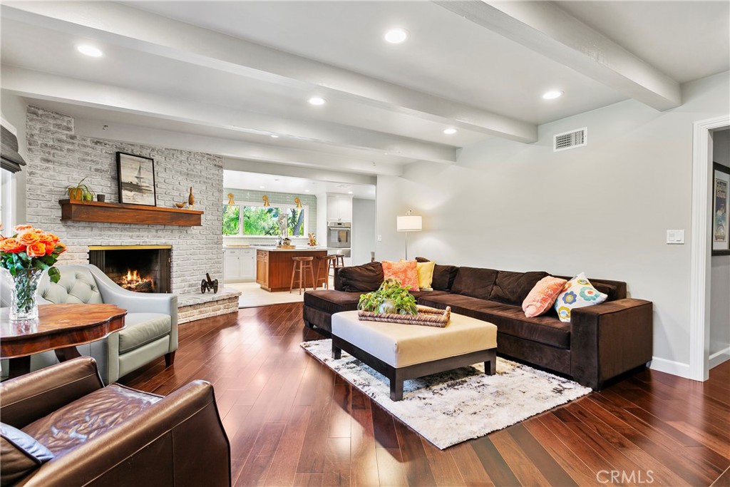 3305 Rancho Rio Bonita Road Covina, CA 91724 - Photo 12 of 71 a living room with furniture and a fireplace