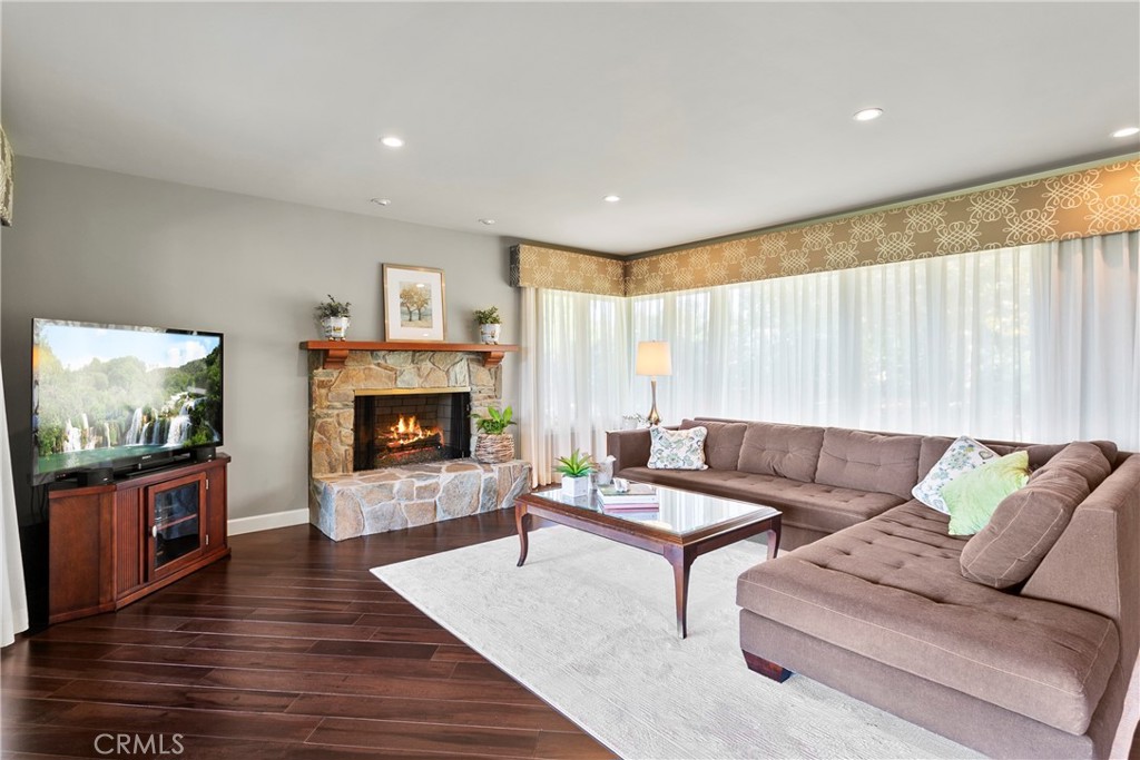 3305 Rancho Rio Bonita Road Covina, CA 91724 - Photo 23 of 71 a living room with furniture and a fireplace