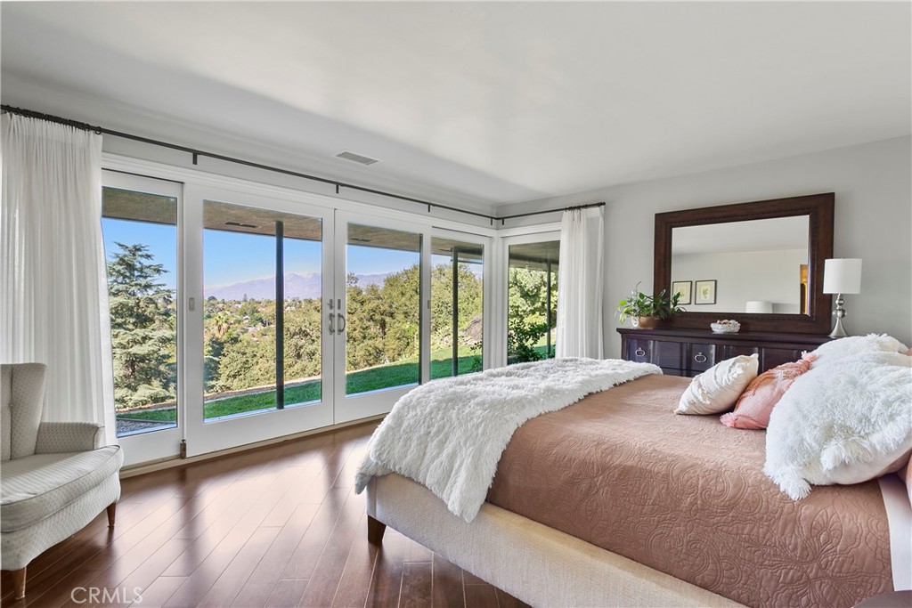 3305 Rancho Rio Bonita Road Covina, CA 91724 - Photo 27 of 71 a bedroom with a large bed and a large window