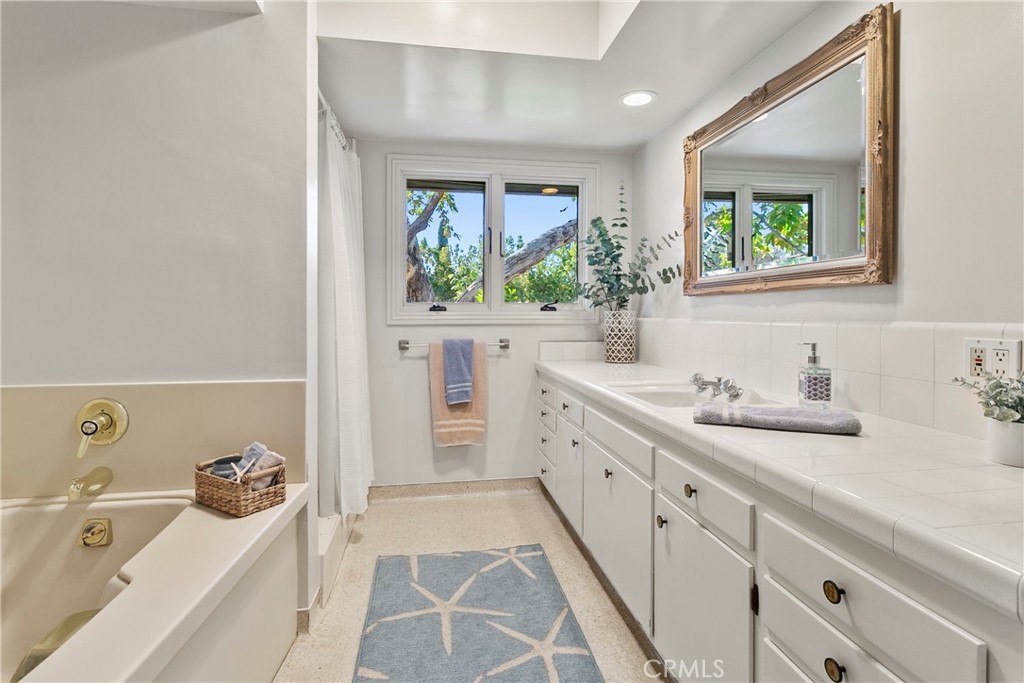 3305 Rancho Rio Bonita Road Covina, CA 91724 - Photo 37 of 71 Hallway bath with tub and separate shower