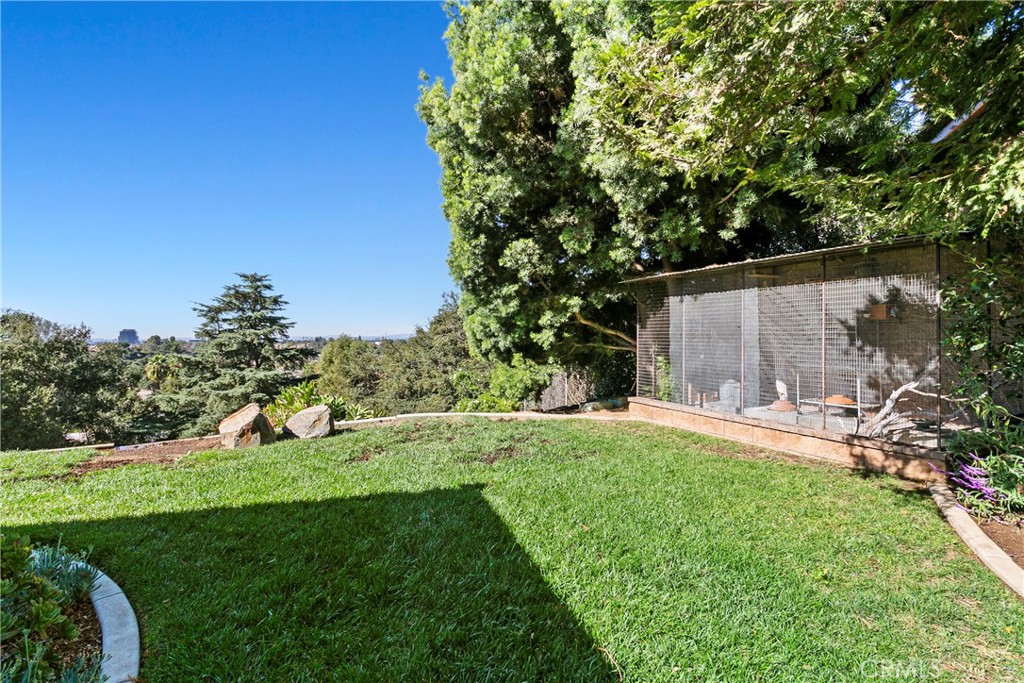 3305 Rancho Rio Bonita Road Covina, CA 91724 - Photo 55 of 71 a view of a backyard with a garden and entertaining space