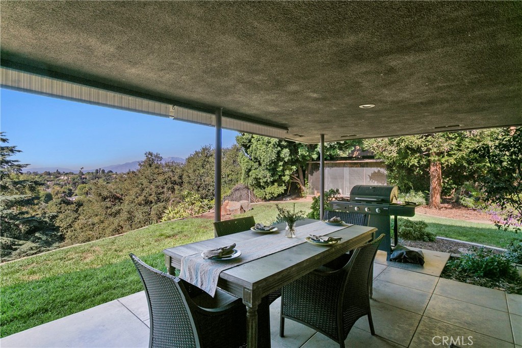 3305 Rancho Rio Bonita Road Covina, CA 91724 - Photo 56 of 71 a view of a patio with a table chairs and a backyard