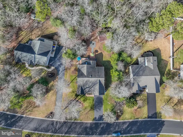 an aerial view of a house with garden space