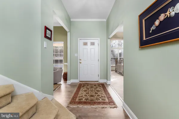 a bedroom with a bed and a rug