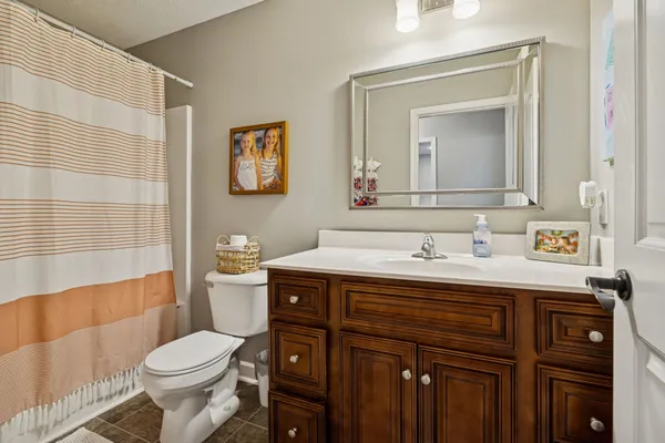 a bathroom with a sink and a toilet
