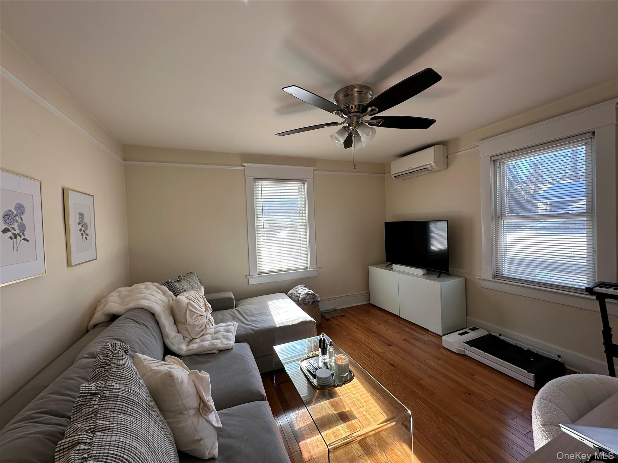 5 Fairmount Street, Unit 3 Huntington, NY 11743 - Photo 5 of 6 Sun-filled Living Room with Hardwood Floors