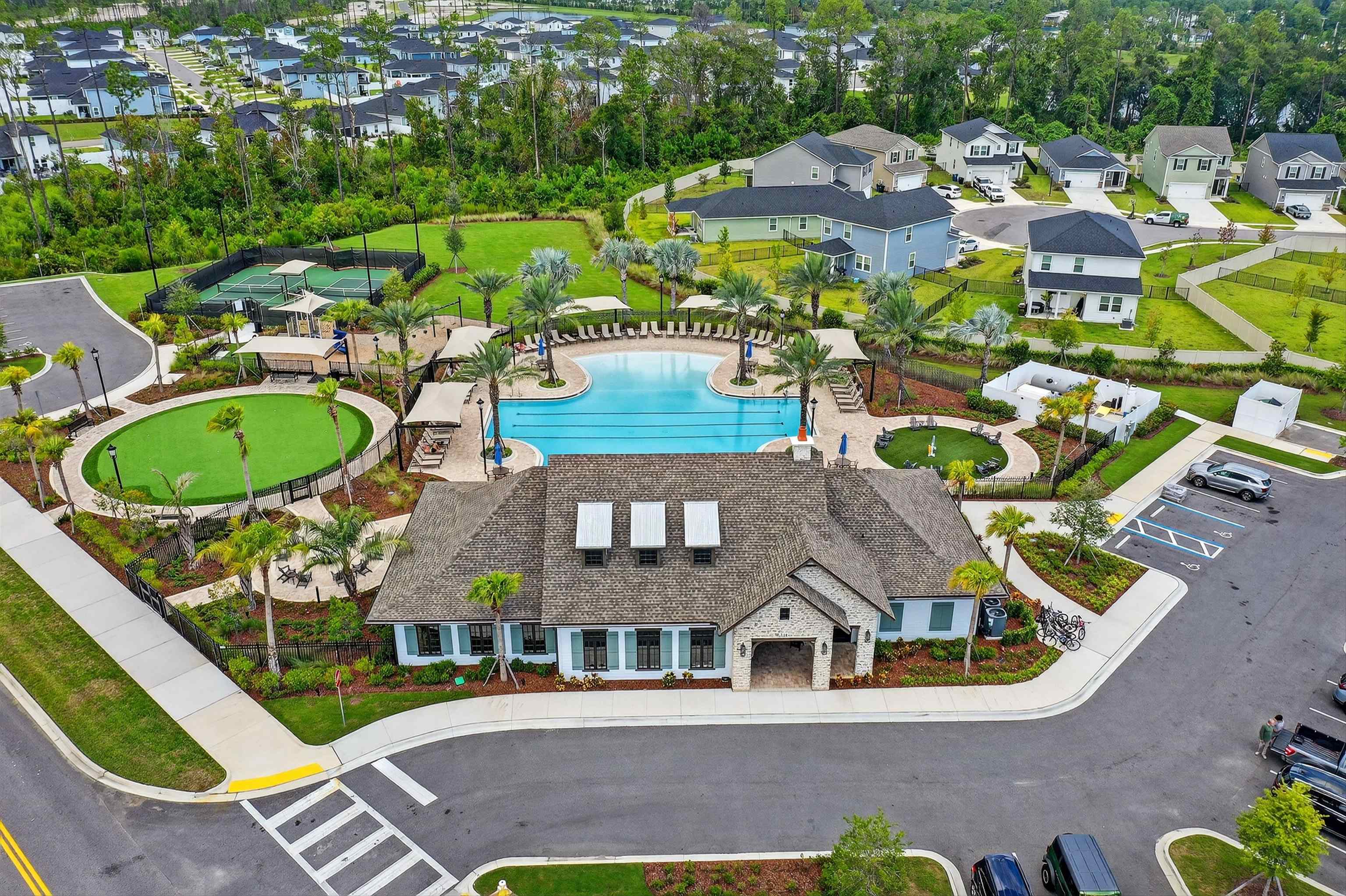 168 Torres Trace St. Augustine, FL 32095 - Photo 36 of 51 an aerial view of a house with a swimming pool patio and outdoor seating