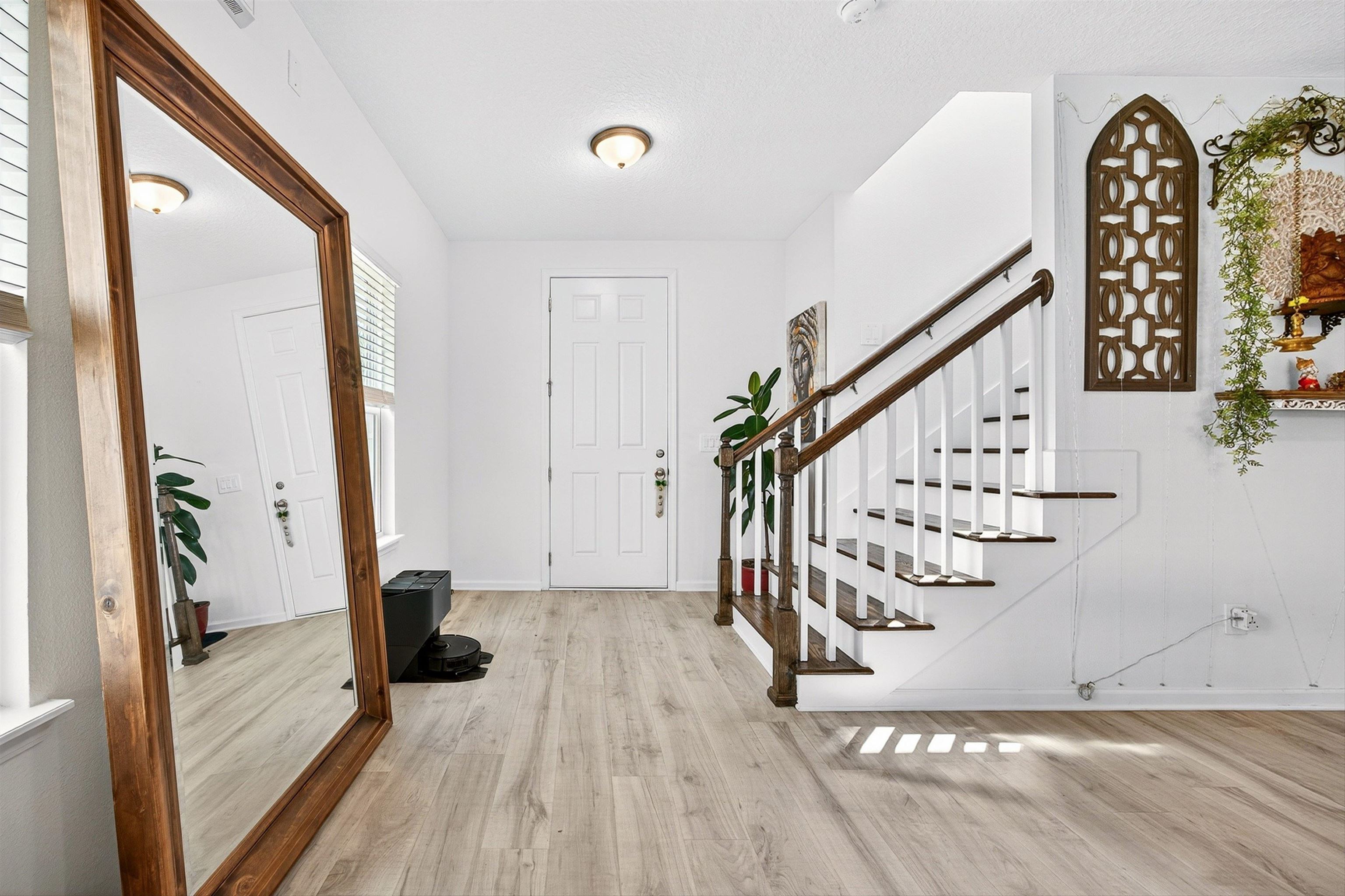 168 Torres Trace St. Augustine, FL 32095 - Photo 7 of 51 a view of entryway with wooden floor