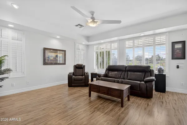 a spacious bathroom with a shower and a sink