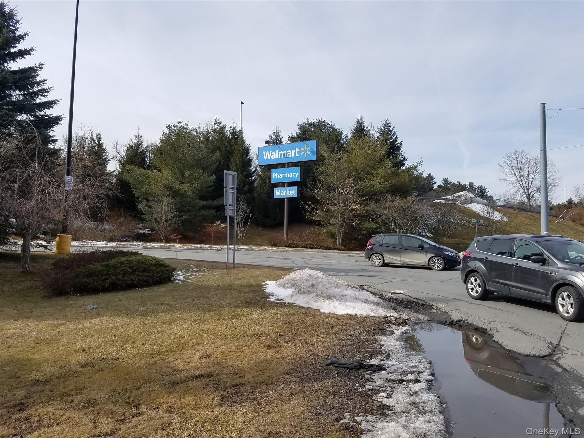 59 Lanahan Road Monticello, NY 12701 - Photo 12 of 12 a view of a cars parked on the side of a road