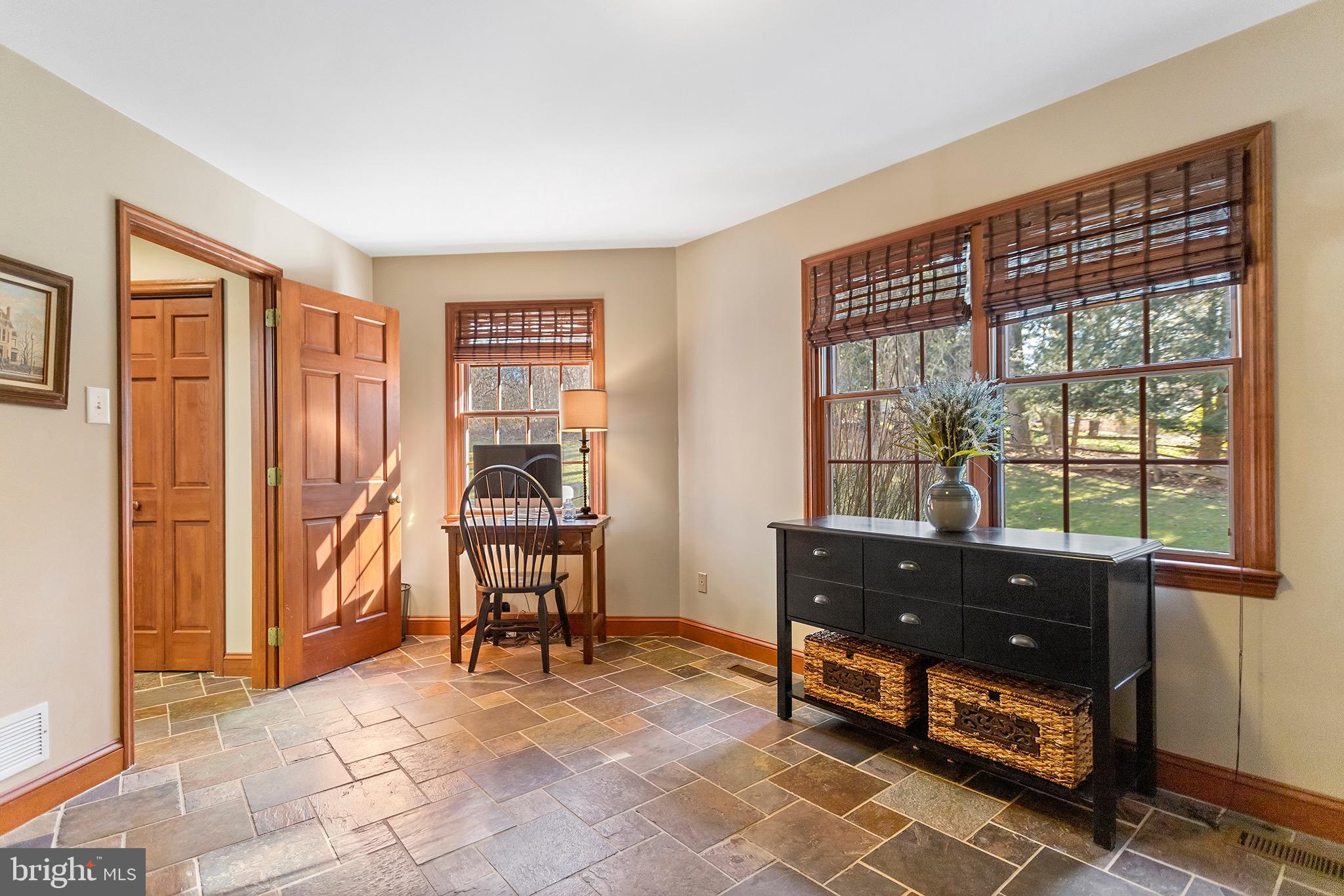 1310 Stackhouse Mill Road Newtown Square, PA 19073 - Photo 17 of 40 a living room with furniture and a window