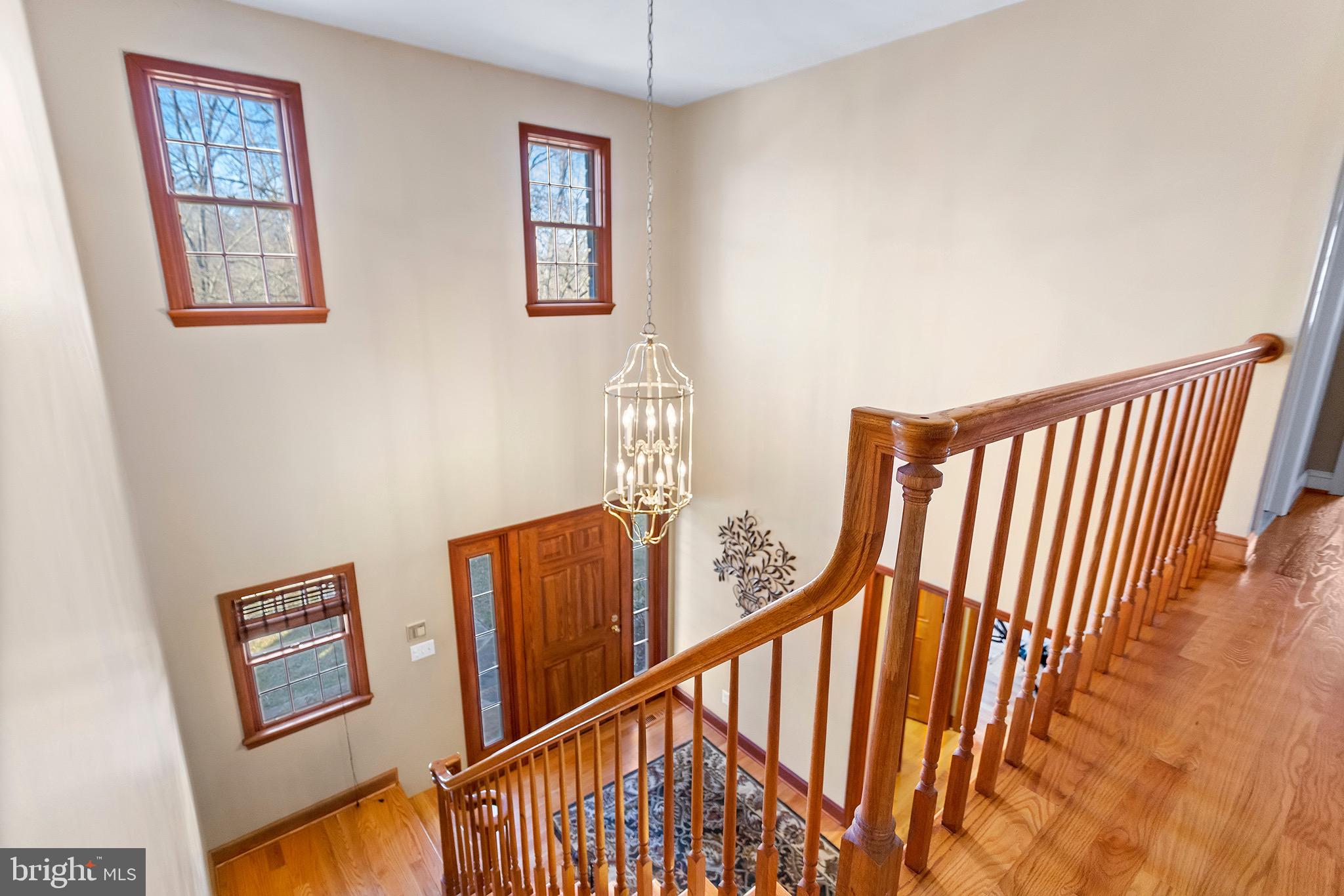 1310 Stackhouse Mill Road Newtown Square, PA 19073 - Photo 18 of 40 a view of an entryway with wooden floor