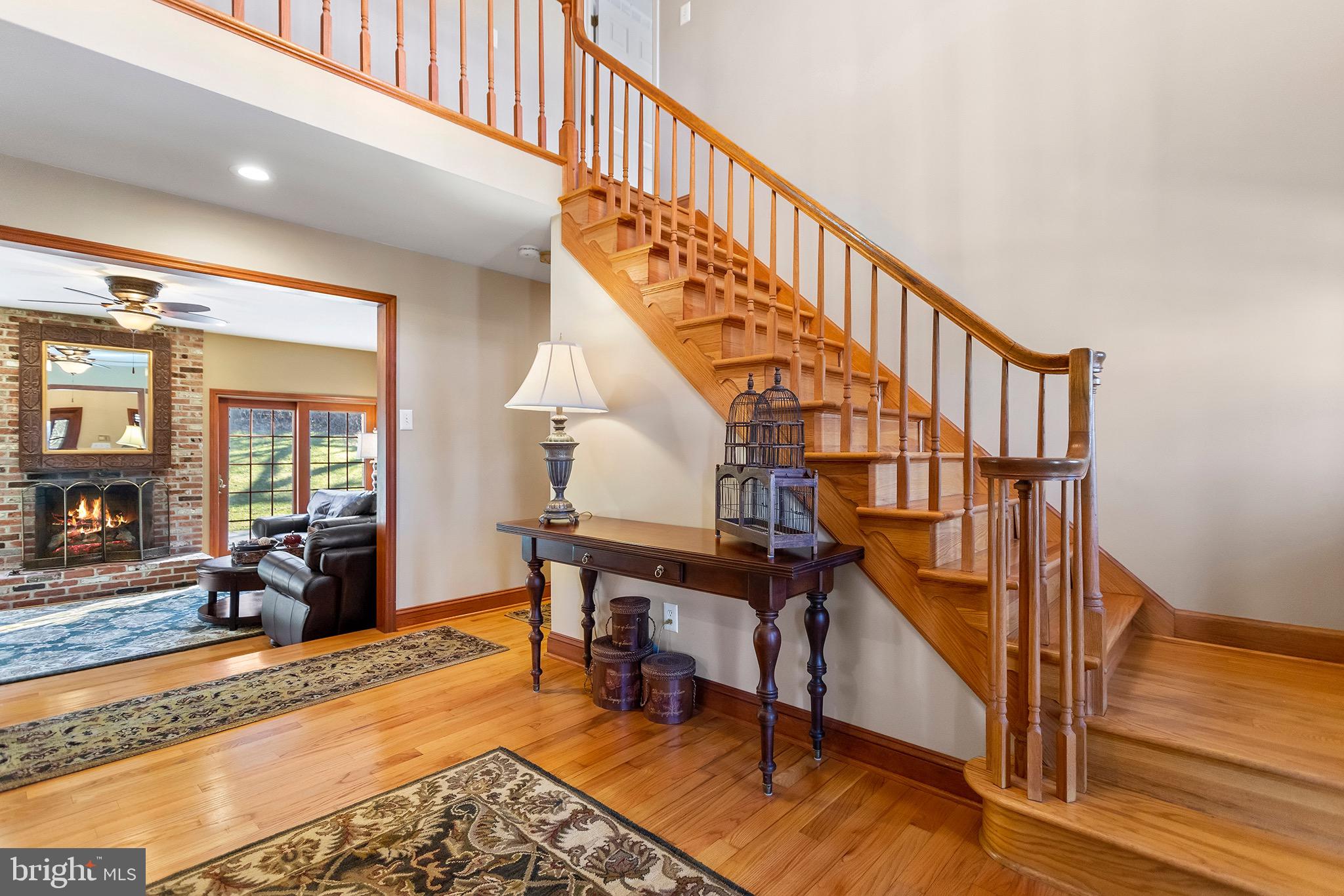 1310 Stackhouse Mill Road Newtown Square, PA 19073 - Photo 3 of 40 a view of entryway livingroom and hall with wooden floor