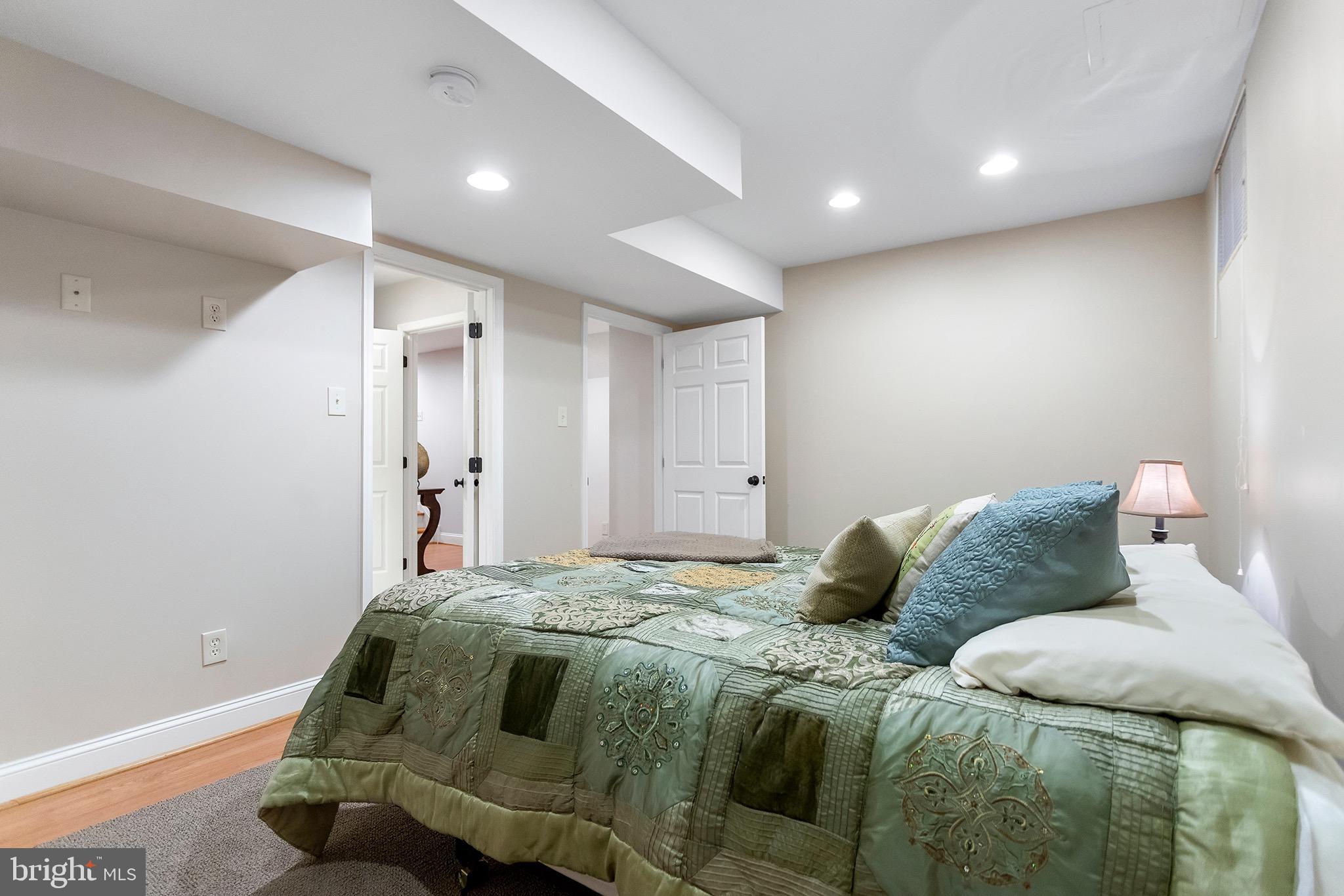 1310 Stackhouse Mill Road Newtown Square, PA 19073 - Photo 34 of 40 a bedroom with a bed and a window