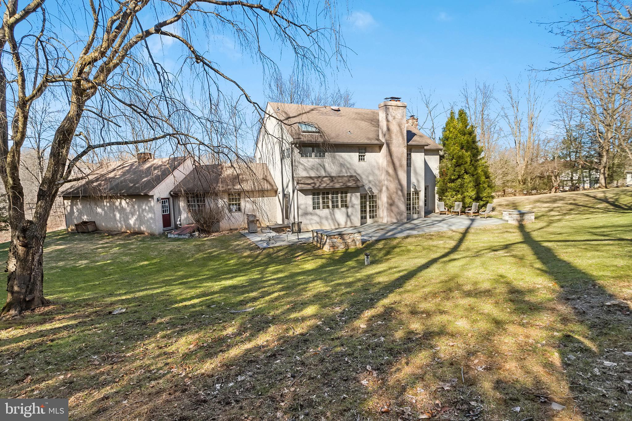 1310 Stackhouse Mill Road Newtown Square, PA 19073 - Photo 39 of 40 a view of a house with a yard