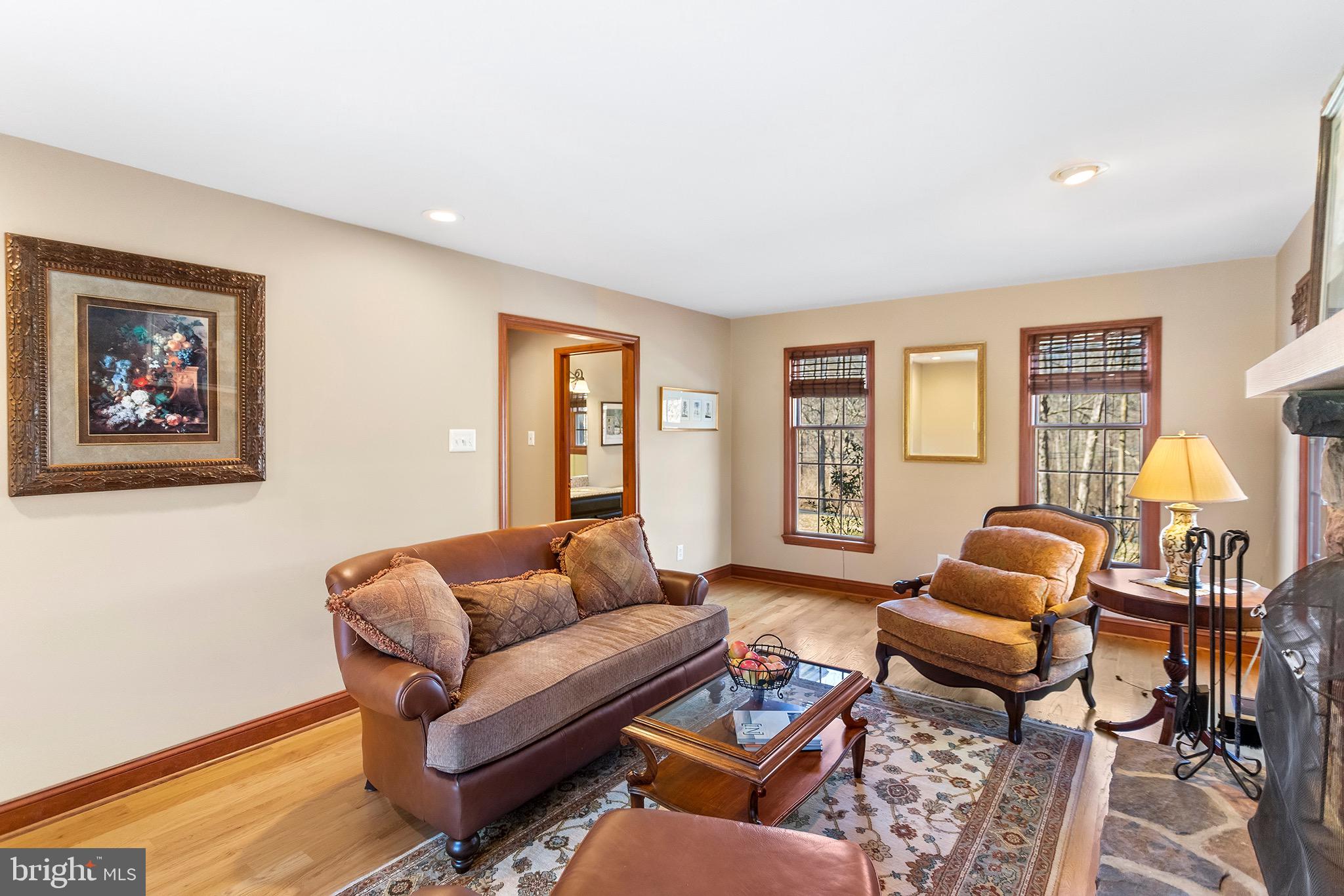 1310 Stackhouse Mill Road Newtown Square, PA 19073 - Photo 6 of 40 a living room with furniture and a window