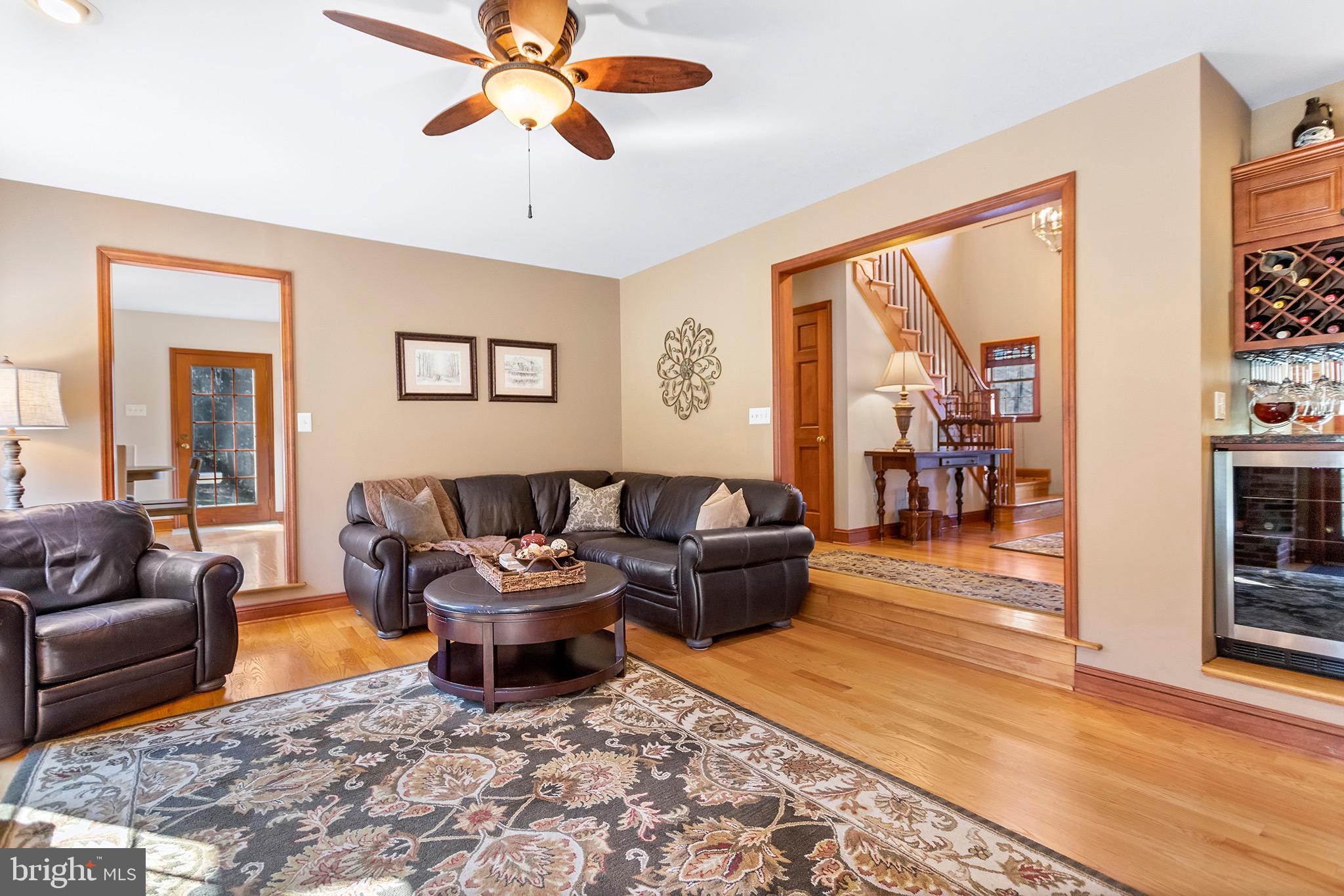 1310 Stackhouse Mill Road Newtown Square, PA 19073 - Photo 10 of 40 a living room with furniture and a window