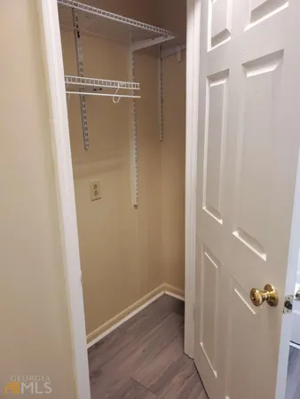 view of a room with wooden floor