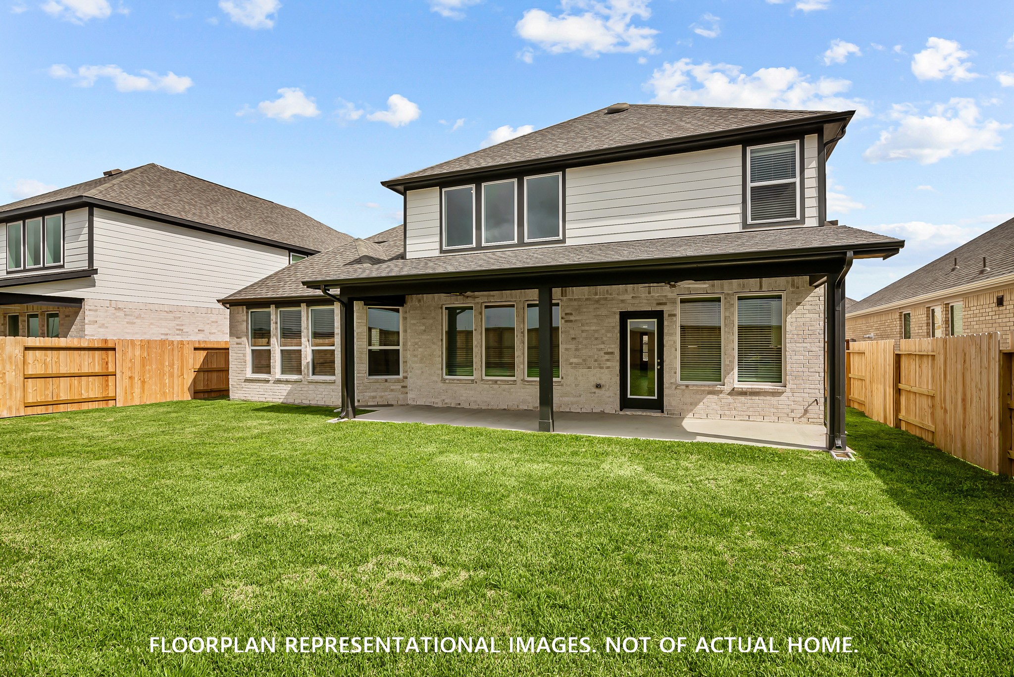 443 6th Street Magnolia, TX 77355 - Photo 8 of 19 a front view of a house with a garden