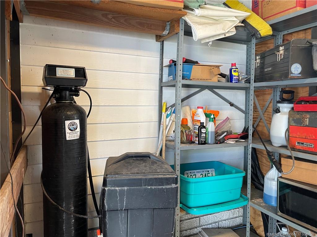 16446 Southwest Three Wood Way Indiantown, FL 34956 - Photo 13 of 32 a view of storage room