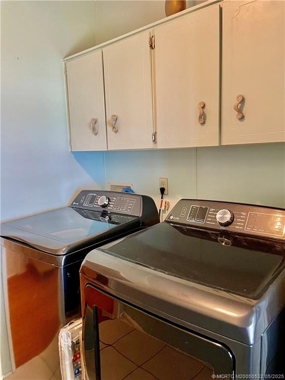 16446 Southwest Three Wood Way Indiantown, FL 34956 - Photo 32 of 32 a view of kitchen with stainless steel appliances granite countertop white cabinets stove and a microwave