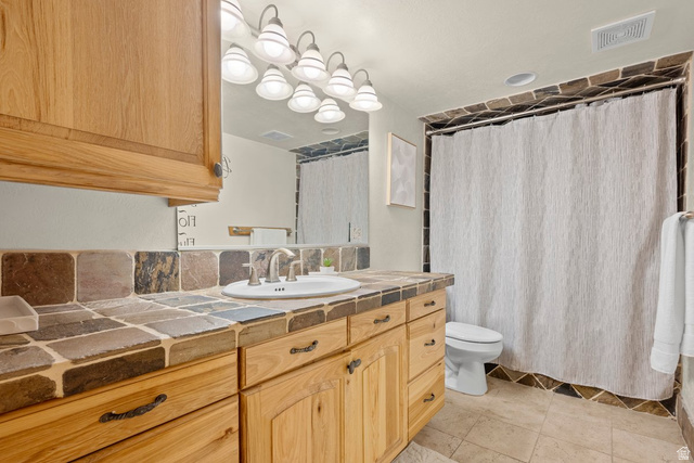 288 South Hillside Drive Elk Ridge, UT 84651 - Photo 19 of 27 Full bathroom with tub and shower