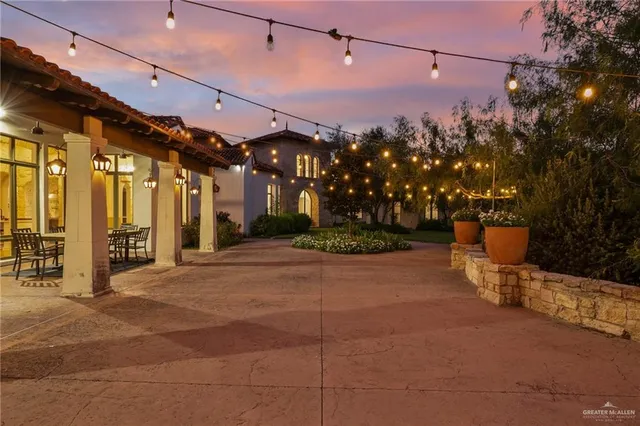 a outdoor view of a building with traffic signal lights