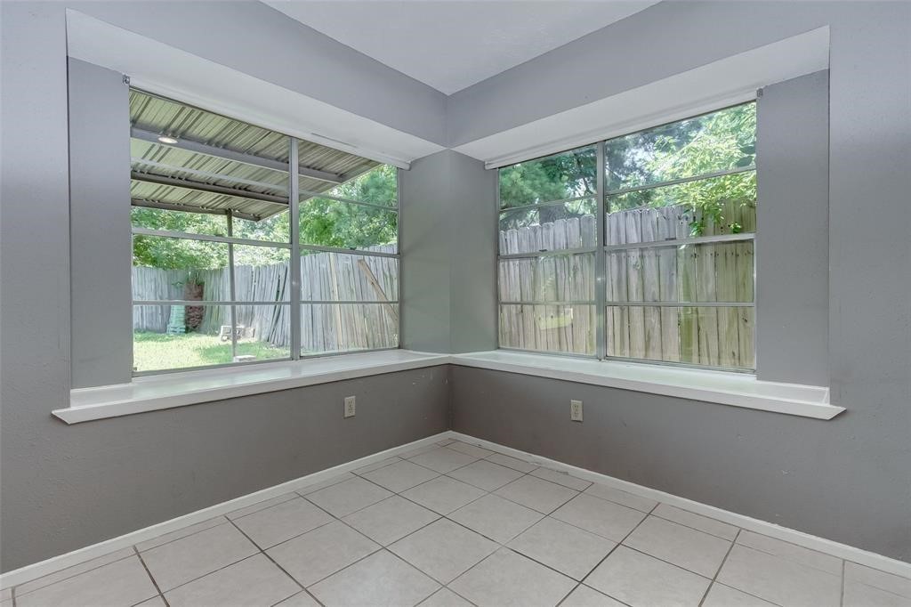 7659 Winkle Wood Lane Houston, TX 77086 - Photo 8 of 24 a view of empty room with window