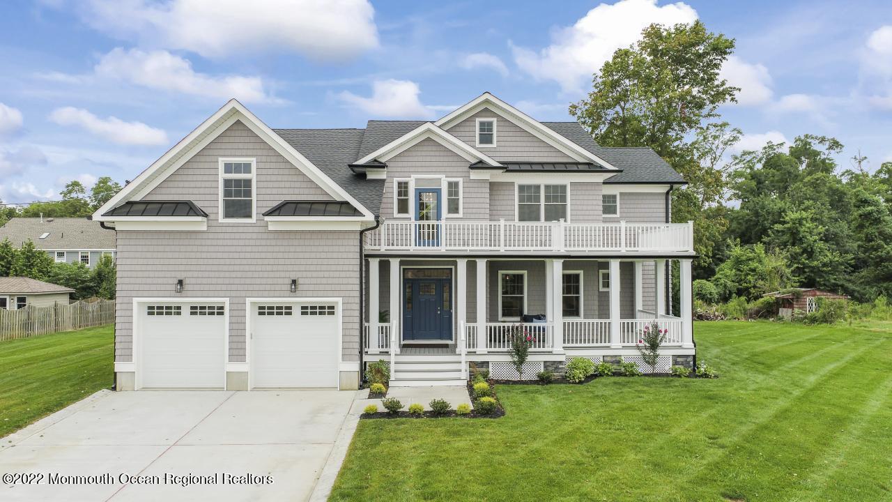 108 Horseneck Point Road Oceanport, NJ 07757 - Photo 1 of 37 a front view of a house with a garden