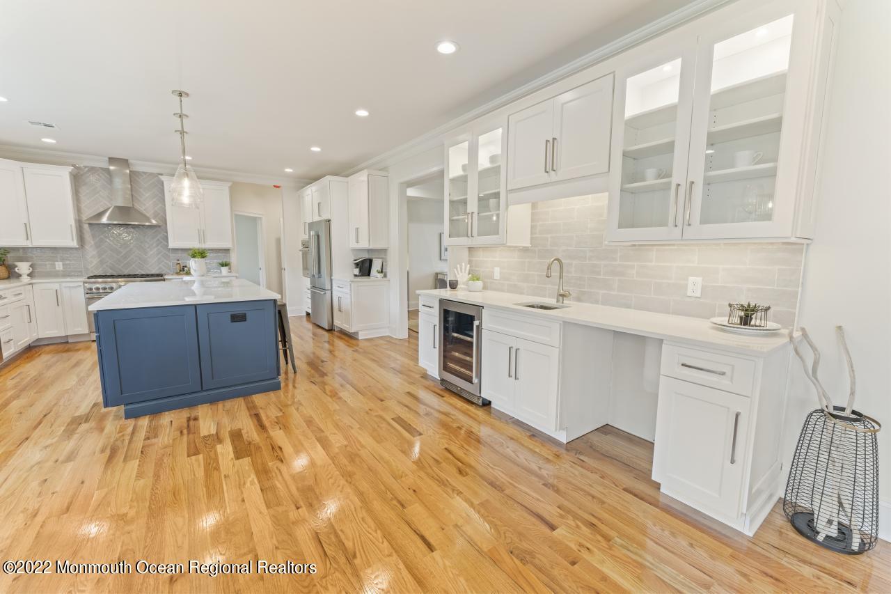 108 Horseneck Point Road Oceanport, NJ 07757 - Photo 15 of 37 a large kitchen with kitchen island a sink stainless steel appliances and cabinets