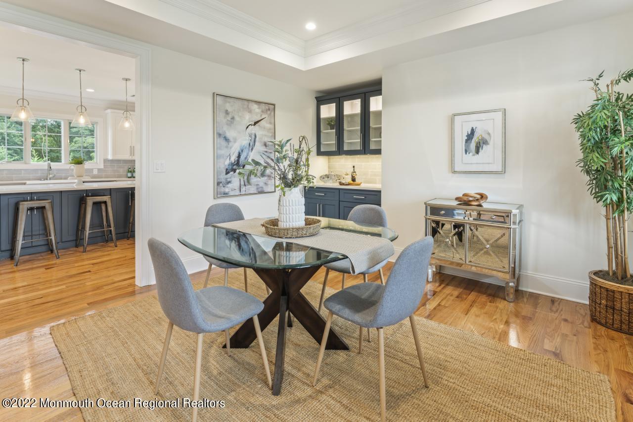 108 Horseneck Point Road Oceanport, NJ 07757 - Photo 18 of 37 a view of a dining room with furniture and wooden floor